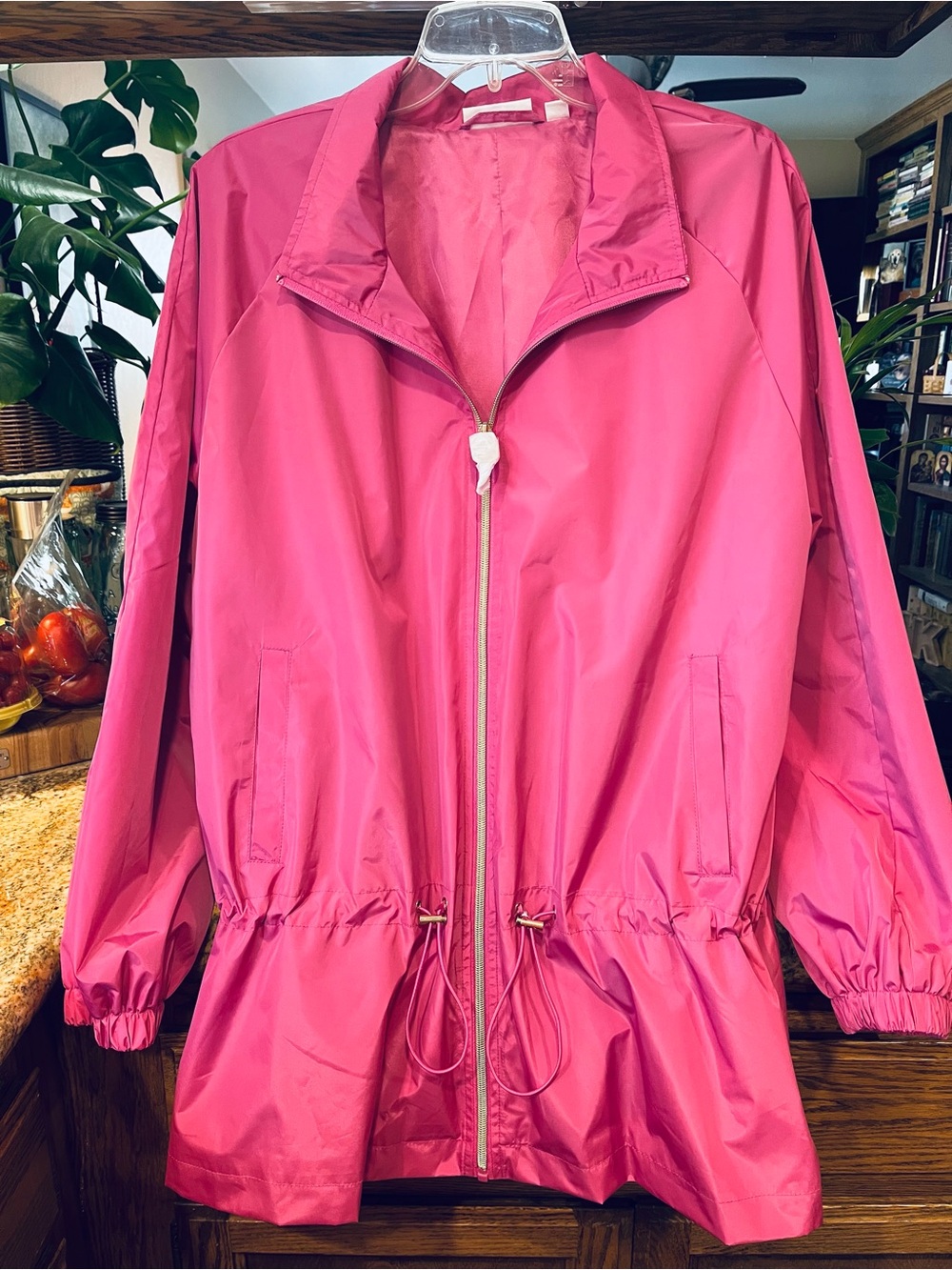 Belle-Women’s Lightweight Pink Windbreaker Jacket with gold hardware.